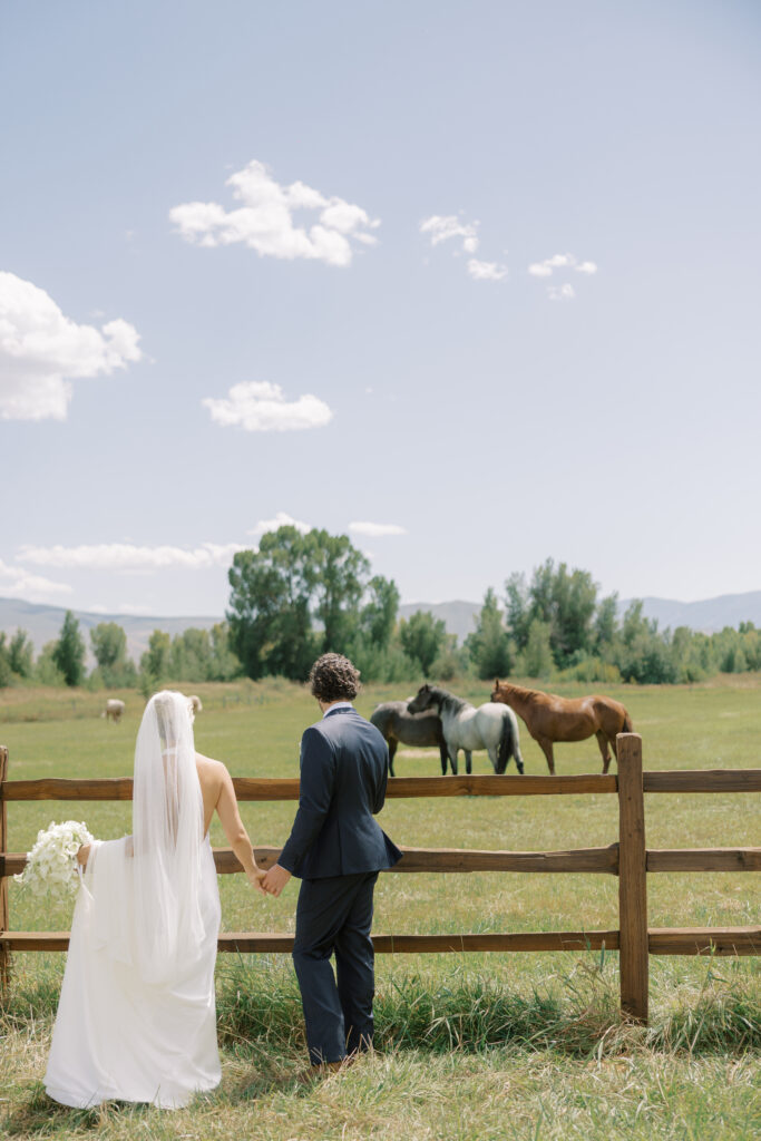 Modern white bridal bouquet featuring orchids and calla lilies for a wedding in Midway Utah